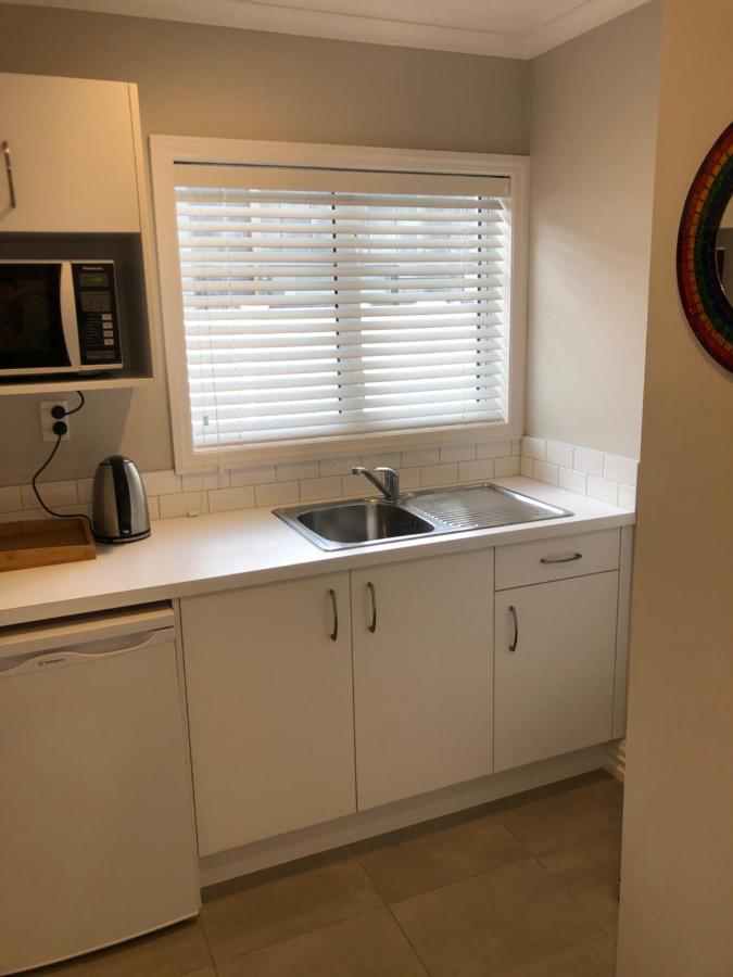 Apartamento The Boathouse One Tree Point Exterior foto